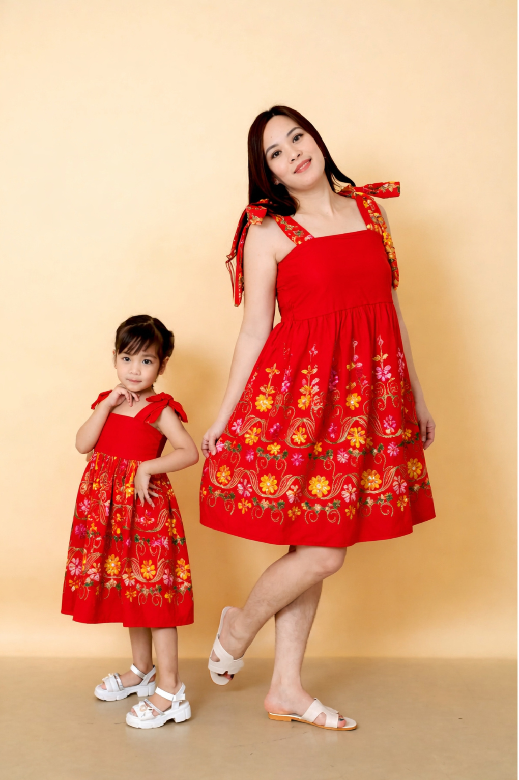 Happy family wearing matching MiniMe outfits together